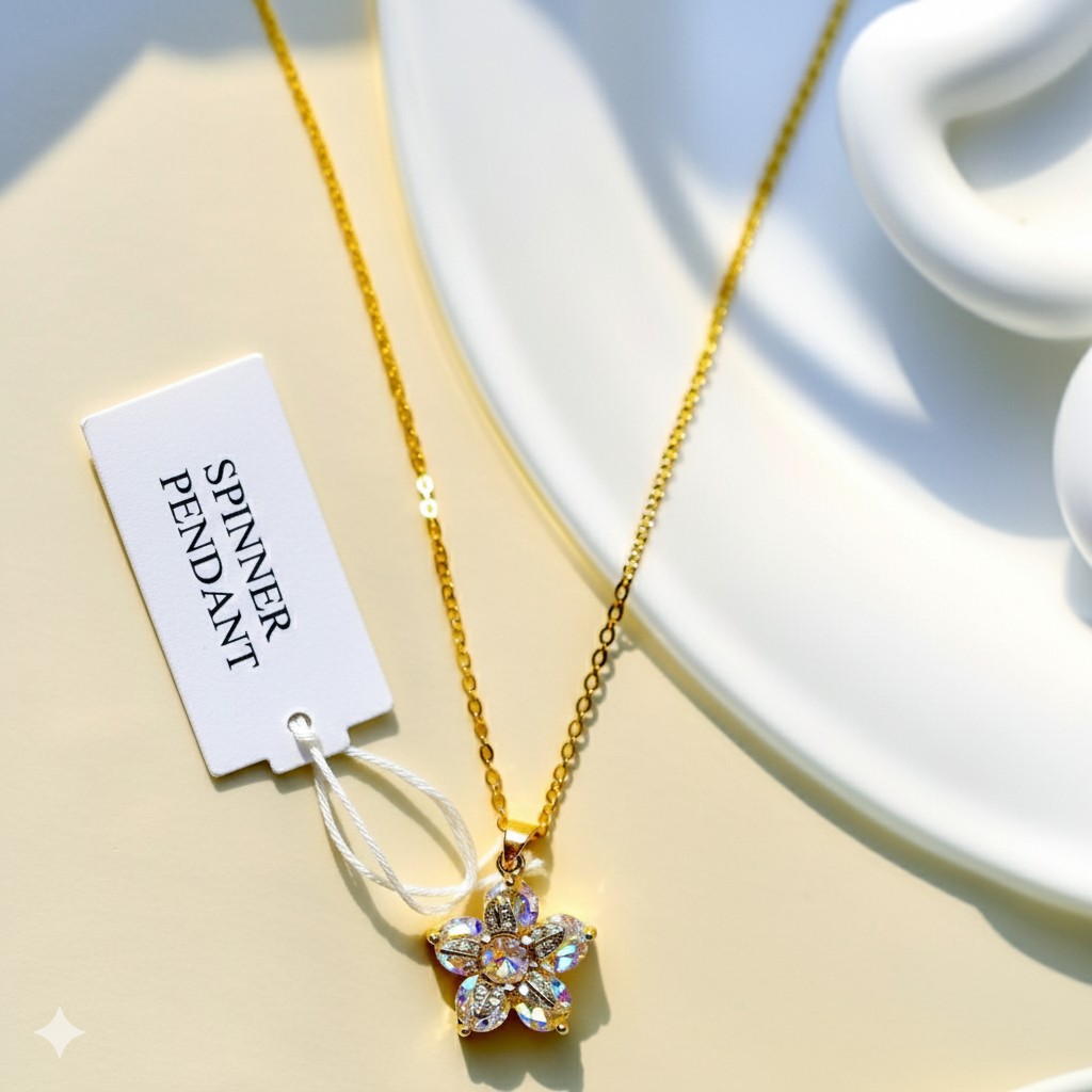 Star Spinner Necklace with Gold Chain and Floral Pendant